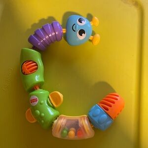 Fisher-Price Brilliant Basics Snap-Lock Caterpillar toy.